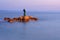 Statue of the mermaid in Podgora in evening