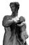 Statue of a mother breastfeeds her infant son breast