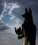 Statue of mythology jackal anubis sky and clouds