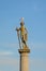 Statue of a naked man with a sword, with a gull on his head in Luxembourg garden, Paris