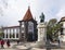 Statue of navigator JoÃ£o GonÃ§alves Zarco in Funchal, Madeira with Bank of Portugal on the background