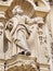 Statue of old-aged bearded man on the facade of The Basilica of Saint Mary of Coro in San Sebastian