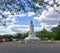 Statue of Peace and the Hop On Hop Off Tourist Bus in Washington DC