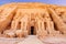 Statue of the pharaoh Rameses II at The Great Temple of Rameses II in Abu Simbel Village