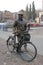 Statue of polish journalist stary marych with bike in Poznan