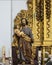 Statue of Saint Anthony of Padua to the left of the baroque main altarpiece of the Chapel of San Juan de Letran in Zahara, Spain.