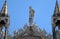 Statue of Saint, detail of the facade of the Saint Mark`s Basilica in Venice