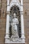 Statue of Saint Eligius in the Tabernacle in the Exterior Perimeter of the Church of Orsanmichele in Florence, Italy