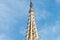 Statue of Saint Eulalia, patron saint of the city, on the spire of the Metropolitan Cathedral Basilica of Barcelona, located in