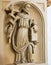 Statue of a saint holding a cross with a serpent in the Cathedral of Otranto, Apulia