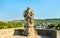 Statue of Saint Joseph with Jesus on Alte Mainbrucke, the old bridge across the Main river in Wurzburg, Germany