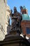 Statue of San Petronio under the towers Bologna