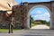 Statue of a soldier standing in front of a city gate in Alba Iulia