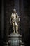 Statue of St Bartholomew Flayed inside famous Milan Cathedral Duomo di Milano. Scary Gothic statue on dark background