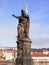 Statue of St. John the Baptist, the sculpture of Charles Bridge in Prague, Czech Republic