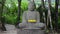 Statue of stone Buddha in the garden
