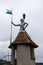 Statue tower on old defense wall in Lucerne Switzerland overcast day