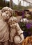 Statue of two brothers against the backdrop of a nice garden