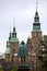 Statue of Tycho Brahe looking towards the renaissance castle Rosenborg in Copenhagen. The castle was build 23 years after Tycho\'s