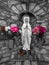 Statue of virgin mary colourfull  magenta red pink white flowers holy Madonna