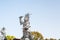 Statue of the Viruá¸haka Heavenly King in front of Golden statue of bodhisattva guanyin Mount Luojia, Zhoushan, Zhejiang, the