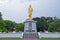 Statue of walking Buddha enshrined at Bung Phalanchai Lake, Roi Et Province, northeastern Thailand