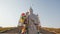 Statue of white elder at entrance to golden abode of buddha