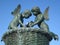 Statue of winged little girl and boy