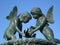 Statue of winged little girl and boy