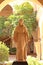 Statue of a woman in flowing robes entitled Religion in the courtyard of the Casa del Prado at Balboa Park