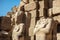 Statues of ancient Egyptian pharaohs and gods. Various hieroglyphs on the walls. Karnak temple is the largest complex in Egypt