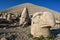 Statues of Apollo left, Zeus centre and and a Persian eagle god right on the weatern face at Mt Nemrut in Turkey.