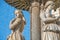 Statues of beautiful women as musicians and singers of State Opera fountain in Vienna, Austria, details, closeup