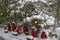 Statues of Buddha call Jizo with snow in Sendai, Japan