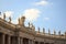 Statues on the colonnade. St. Peter`s Square. Vatican City, Rome