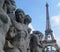 Statues and Eiffel Tower