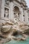 Statues of the majestic Trevi fountain in Rome with Neptune in the center