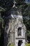 Statues of mourning at the graves of the monumental cemetery in Milan.