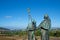 Statues of Pilgrims pointing the cathedral on Monte do Gozo in Santiago de Compostela, Spain