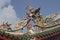 Statues on the roof of a chinese temple in the streets of Kuching of Malaysia