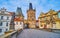 The statues of the Saints and Mala Strana Bridge Tower of Charles Bridge, Prague, Czech Republic