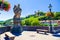 Statues of St Mary stands on a dragon on the Old Main Bridge. Summer cityscape. Wurzburg is a city located on Main River. Germany