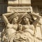Statues of the two caryatids on the facade of a historic building on Griboyedov canal of St. Petersburg