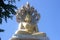 Statuette of Buddha with dragons Buddhist temple in Chiang Mai, Thailand