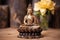 statuette of buddha on a wooden surface