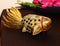 Statuette of a goldfish, golden toy