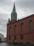 STAVANGER, NORWAY, SEPTEMBER 9, 2019 :View on St. Peter Church or St. Petri Kirke is red brick building and was built in