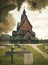 A stave church in Norway, framed by green leaves