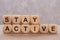 Stay active printed on wooden cubes