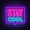 Stay Cool neon sign in the speech bubble on brick wall background.